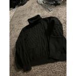 Andrea Jovine  turtleneck sweater Photo 1