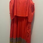 C. Luce Orange Drsss Photo 2