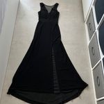 Women size small long black dress with small train bust and waist mesh detail Photo 6