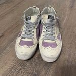 Golden Goose  Mid-Star Photo 1