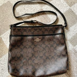 Coach Brown White Monogram Signature File Crossbody Bag Photo 0