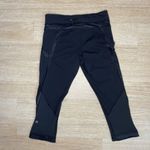 Lululemon  Black Chase Me Crop 2 Leggings Sz 6 Low Rise Stretch Athleisure Glossy Photo 4