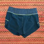 Athleta  TEAL GREEN TRIM RUN WITH IT SHORTS Photo 0