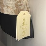 Plunging V neck elastic waist crop mid shirt with poof sleeve open tie back Tan Photo 5