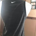 Nike dry fit size small women’s athletic top kind of a blackish Grey Photo 5