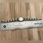 Caravelle by Bulova Ladies Watch Gold Silver Tone Bracelet White Dial Gold Hands Photo 10