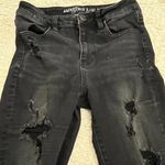 American Eagle black distressed high rise jeggings size 4 Photo 1