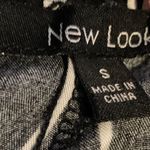 New Look Black And White Striped Flowy Pants Photo 2