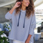 Frank & Eileen Hand-cut raw hem and edges Rolled funnel neck Elbow-length continuous sleeves Signature capelet side slits  Fabric: 100% Cotton  • Made in Sunny California, USA • Care: Machine wash cold, tumble dry low  This is new without tags F&E is a green company and doesn’t have sale tags.  Inside tag has been cut to prevent store returns  10750 Photo 0