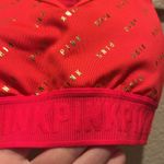 PINK - Victoria's Secret Victoria’s Secret PINK Ultimate Sports Bra Red Gold Logo Size XS Photo 1