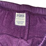 PINK - Victoria's Secret VS PINK purple jogger sweatpants with bedazzled logo detail Photo 2