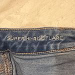 American Eagle - Super Hi-Rise Flare Jeans Large Front Thigh Pockets Size 8 SHORT Photo 3