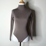 SKIMS  Essential Brown Satin Long Sleeve Mock Neck Bodysuit Photo 1