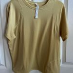 Lululemon  athletica Lightweight Cinched Hem Hiking T-Shirt  Golden Sand-Size 10 Photo 2