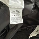 Nike Women's Sportswear Repel Essential Woven Jogger Pants Photo 15