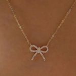Gorgeous gold bow necklace adjustable Photo 0