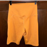 Girlfriend Collective  Saddle High Rise Biker Shorts Rust Orange Brown Yellow Photo 2