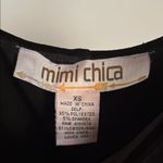 Mimi Chica  Elegant Black Garment Photo 1