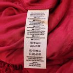 Free People jumpsuit. Red lace w/ deep V & shoulder detail. Color-red size small Photo 2