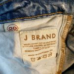 J Brand  cropped raw hem straight leg size 29 distressed/patched jeans. Photo 4