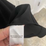 Gorgeous black dress with puff sleeves. Size Medium. Zipper on back. Photo 3