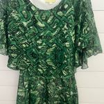 Giani Bernini Gianni Bini green pattern dress 
Beautiful green pattern and following
Size XS‎ Photo 0
