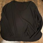 Out From Under Sweater Photo 1