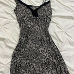 Elegant Black and White Snake Print Dress Photo 0