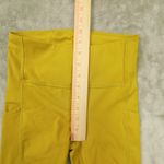 Athleta Ultimate Stash Pocket 7" Shorts Yellow Mustard High Rise Bike size XS Photo 5