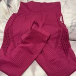 Gymshark woman’s raspberry Burgundy Leggings w cutout. Design Yoga Photo 1