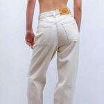 BDG High Waisted Cream Distressed Baggy Jeans Photo 1