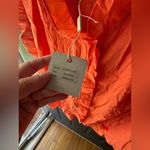 cupio NWT  Vibrant Orange Ruffled Blouse Photo 2