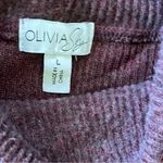 Olivia Sky ” turtleneck sweater Photo 1