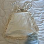 Gimmicks by BKE Gimmick’s white and lace cropped top Photo 0