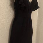 Bebe NWT sexy plunging neck  dress. Side pockets. Sz M. Originally $139 Photo 1