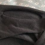 Isela long sleeve top in Black size L. Peek a boo shoulders. Photo 3