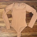 SKIMS New,never worn  seamless thong bodysuit Photo 0