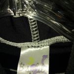 B. Split S Black Surf Shirt Photo 2