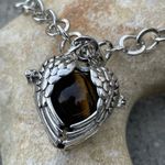 Boutique Tigers Eye stone in a heart shaped necklace cage. 36”chain Photo 3