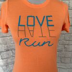 Under Armour Run women S short sleeve shirt orange Photo 1