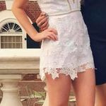 Revolve by the way. Rory Lace Romper in White Photo 3