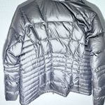 Eddie Bauer  Women's Silver Puffer Jacket with Faux Fur Hood – Size L Photo 3