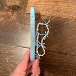 iPhone 14 EUC Floral Bow Phone Case with Pearl Bracelet Accessory Blue Photo 3