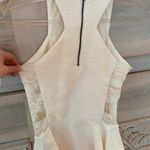 Material Girl White Peplum Top with Lace Sides Photo 1