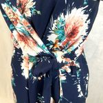 Navy floral burst wrap top cropped jumpsuit with pockets size small Blue Photo 2