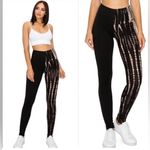 ValMarie Black half and half lightning strike color block leggings size OS Photo 1