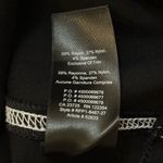 Babaton Aritzia  black mini dress white stitching women’s size 2 Photo 8