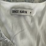 Grace Karin NWOT
Womens Sequn Tops 3/4 Sleeve White and Silver Sequins size M Photo 9