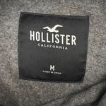 Hollister  grey, black, and green cropped hoodie Photo 2