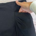 Sasch Black Mini Skirt with Pleated Side Pockets.  Photo 1